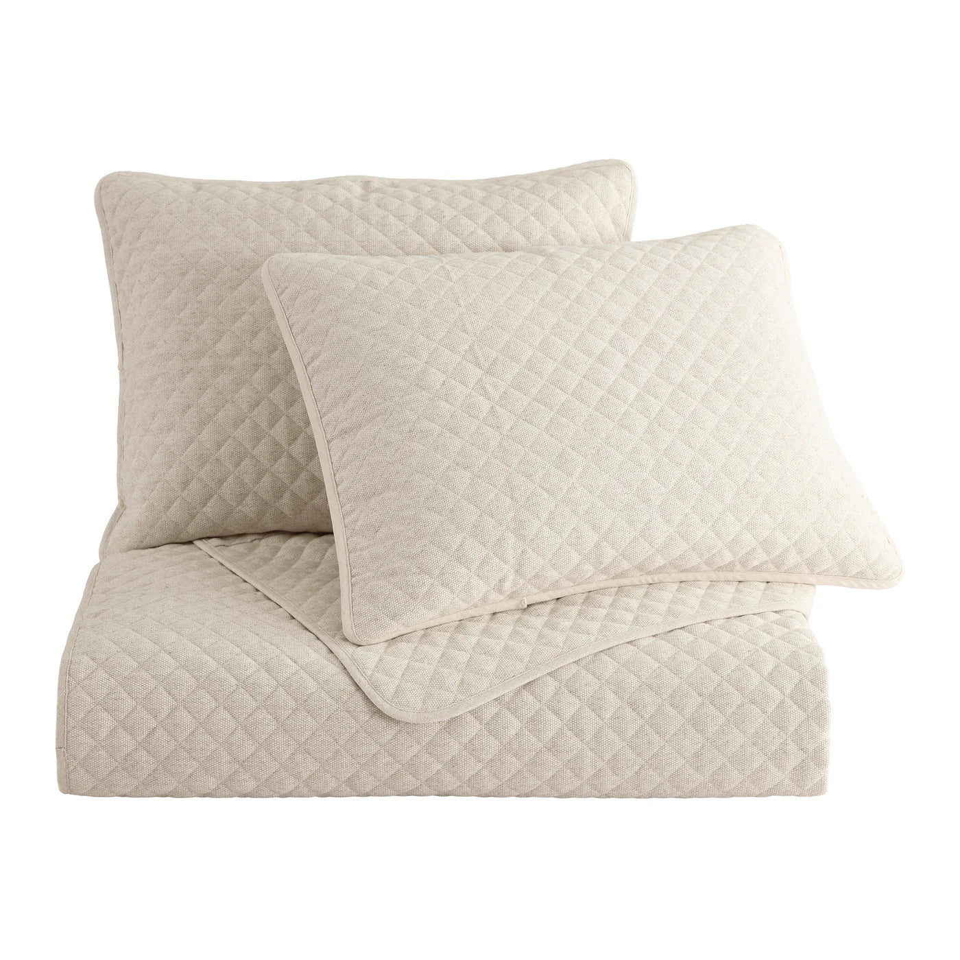 Fawcett linen blend coverlet set with diamond quilted pattern in a neutral tone, styled on a bed with pillow shams
